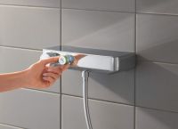 Vorschau: Grohe Grohtherm SmartControl Thermostat-Brausebatterie mit Brausegarnitur 60cm, chrom